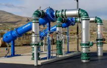 water treatment piping with mountains in background