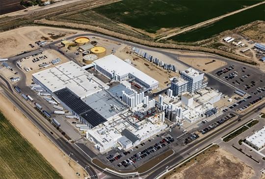 Lactalis Wastewater Treatment Plant Upgrades - IMCO Construction aerial view of white industrial plant