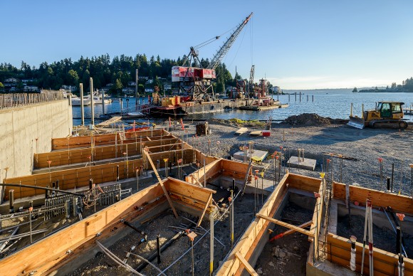Meydenbauer Bay Park construction site with crane on barge Meydenbauer Bay Park with crane on barge and lake Washington in the background