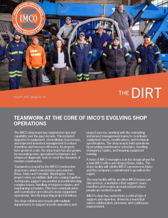 IMCO Construction's Shop Team 2025 Team of shop staff posing on a blue crane in IMCO shop.