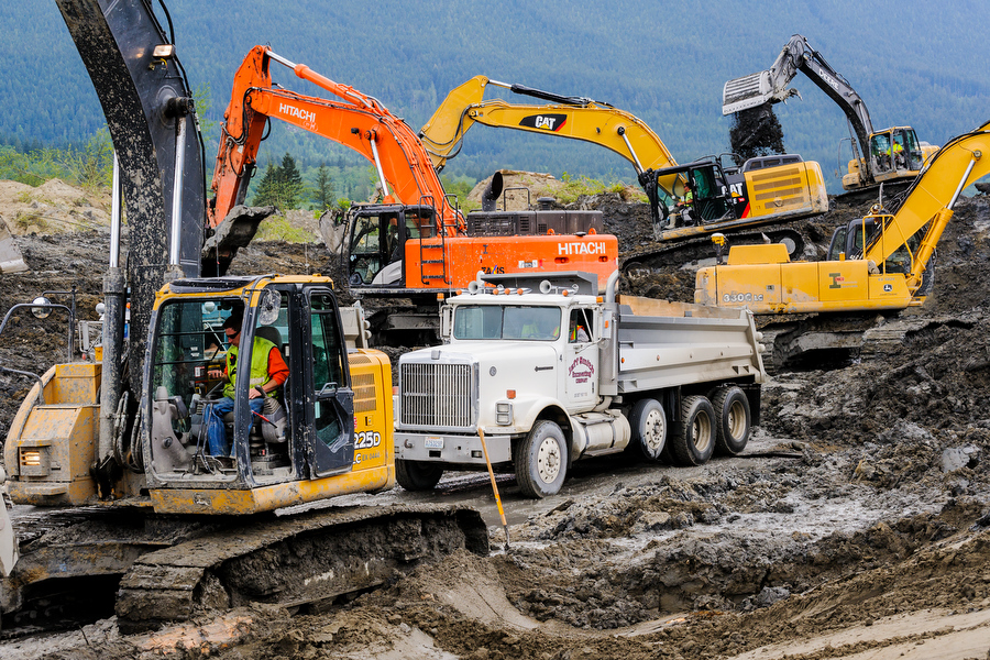 IMCO General Construction. Trucks at Oso slide cleanup