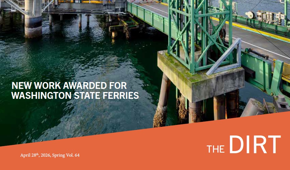 A ferry terminal structure over water with green metal framework and pilings, overlaid with the headline ‘New Work Awarded for Washington State Ferries